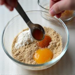 Image showing ingredients being carefully measured and mixed in a glass bowl