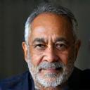 Photo of satisfied customer Raj Mehta looking thoughtful